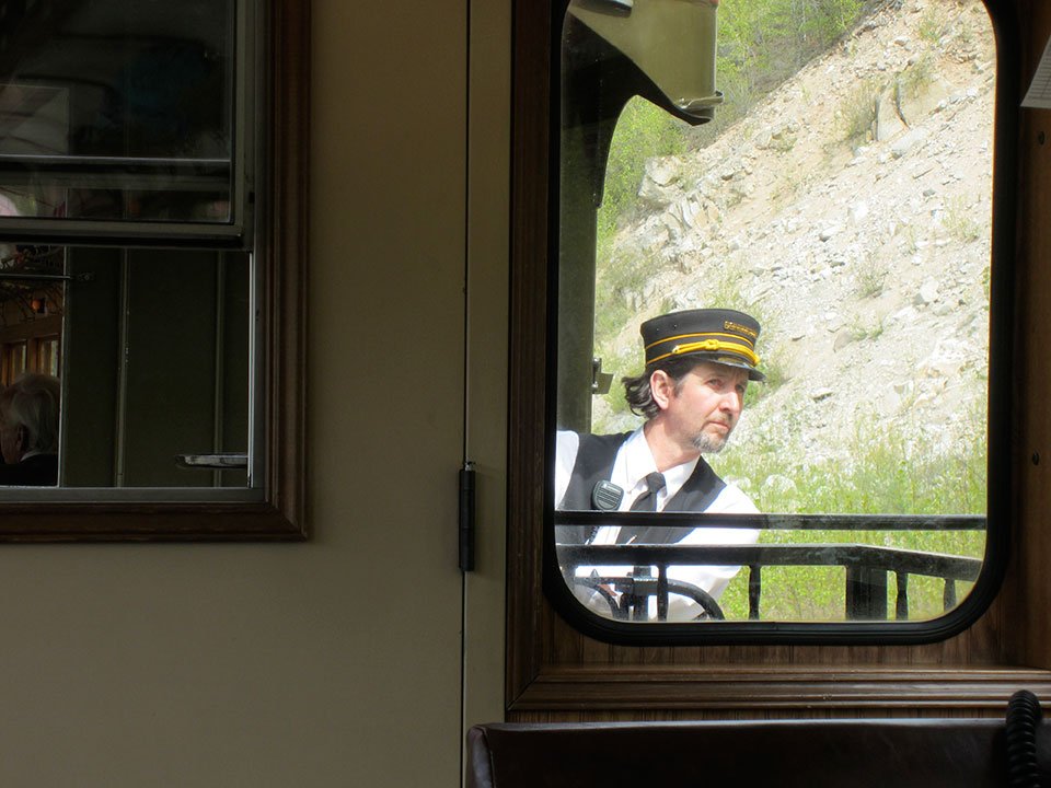 A glimpse into the life of a train conductor. - by Katherine Noverr