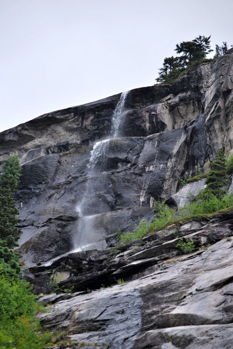 Water falls along the White Pass Route - by Dick Cleckner