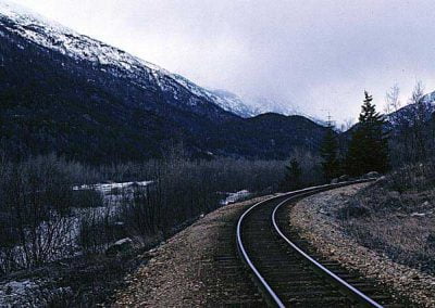 Curve at Gold Rush cementry with Skagway river. Location:Skagway. Milepost:Mile 2. Date:27845