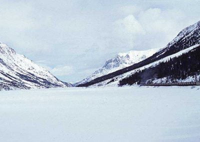 Northbound train along Lake Bennett. Location:MP 45. Milepost:Mile 45. Date:1980-03-00