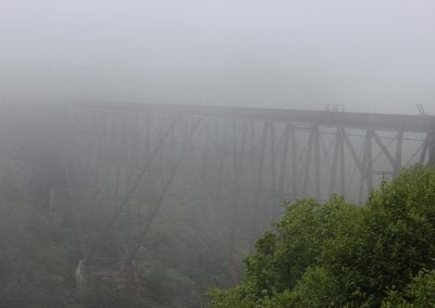 Old Steel Bridge Enveloped in Fog